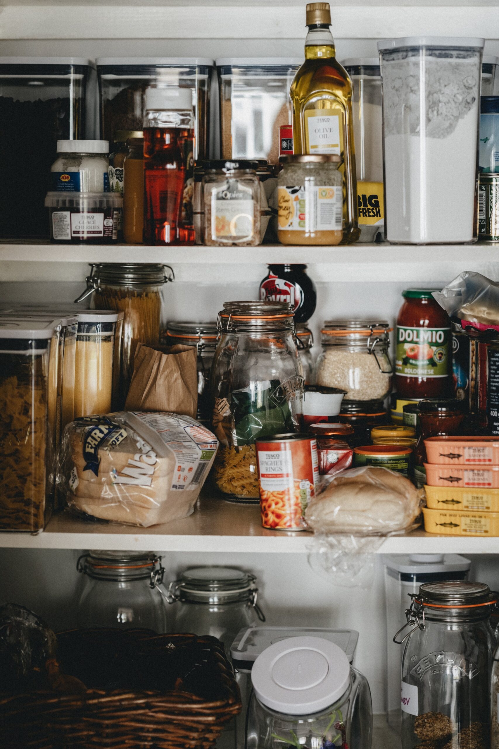 Pantry stocked with canned goods perfect for pairing with a CSA Share